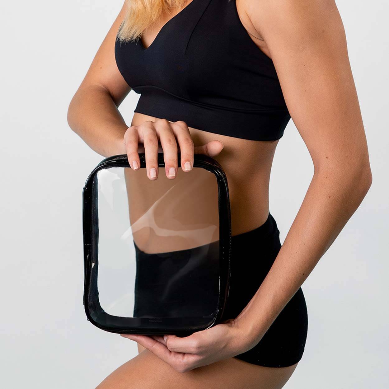 Byrokko waterproof Beauty bag, in the hands of a woman in black underwear.